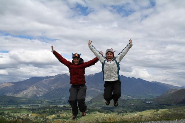 Gay Ski Week QT organisers Mandy (left) and Sally Whitewoods jumping into Gay Ski Week .